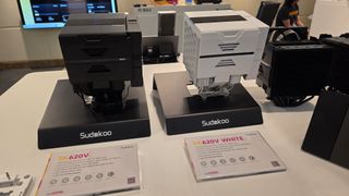 Sudokoo's SK620V air cooler, in white and black, displayed on a table.