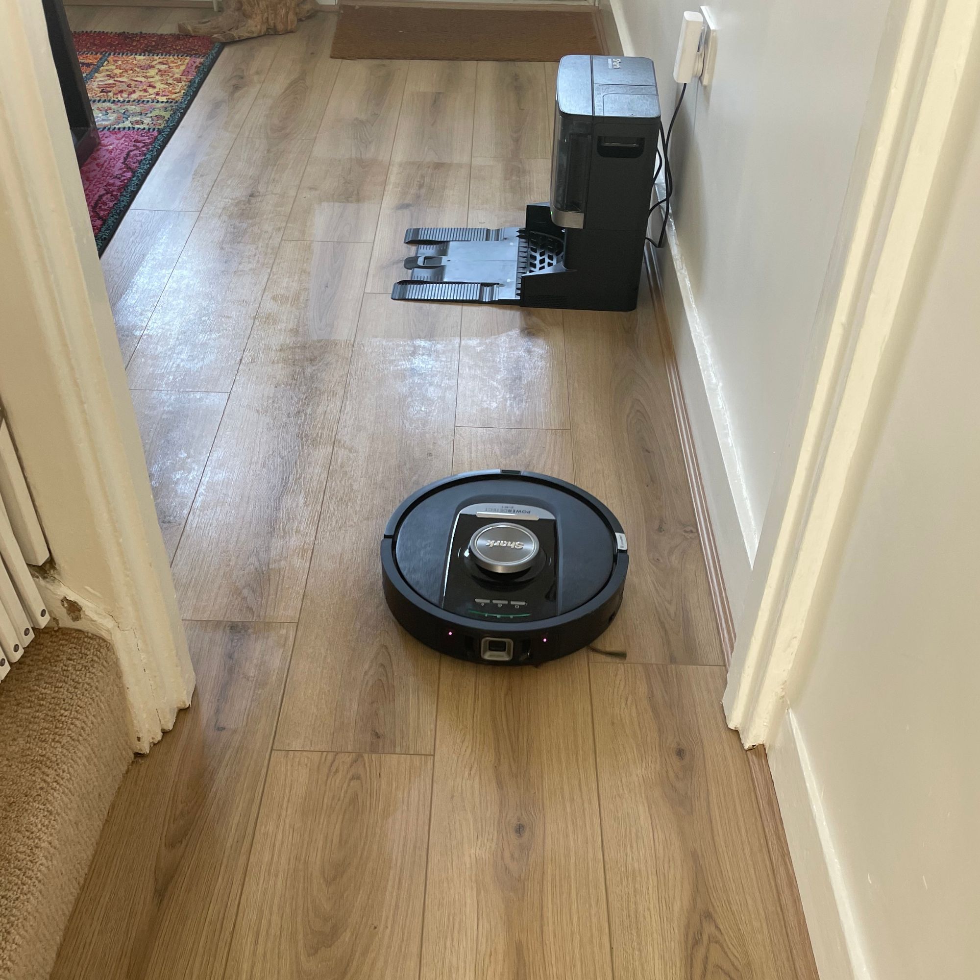 Shark PowerDetect NeverTouch Robot Vacuum mopping wooden floors