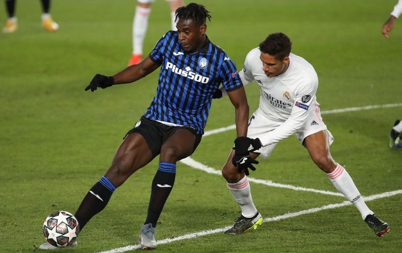 Duvan Zapata and Raphael Varane