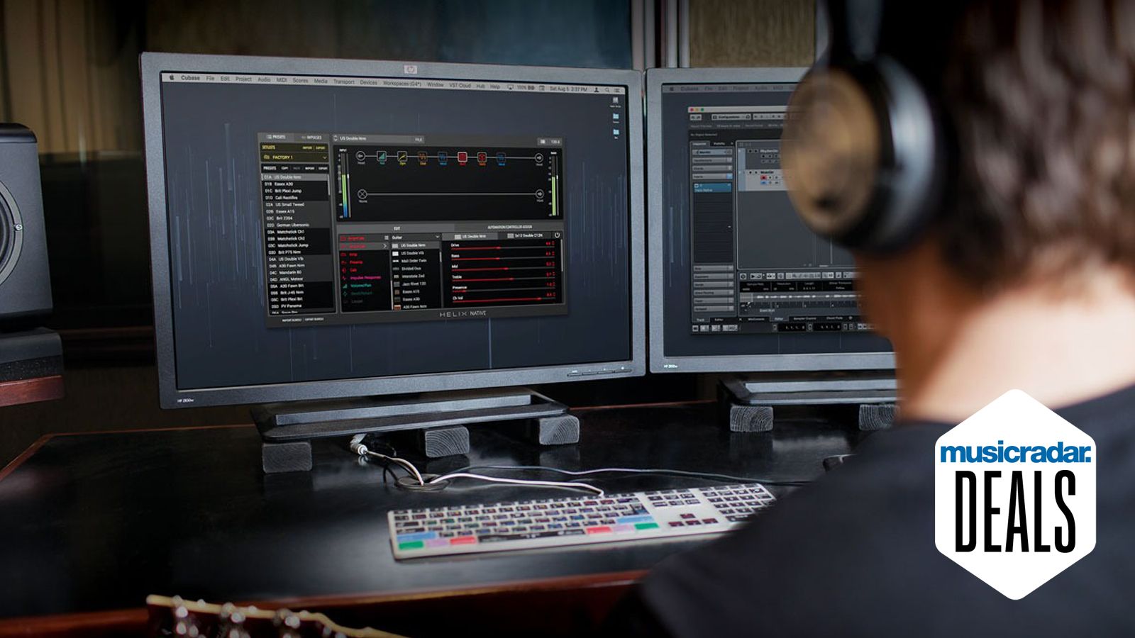 Man plays guitar through Line 6 Helix Native plugin