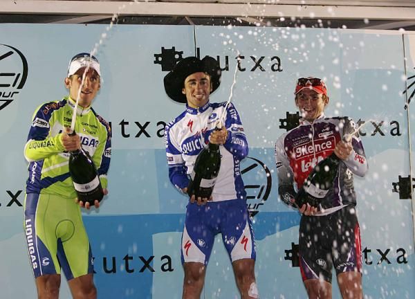 Carlos Barredo (Quick Step) celebrates with Roman Kreuziger (Liquigas) and Micka&euml;l Delage (Silence-Lotto), l &amp; r.