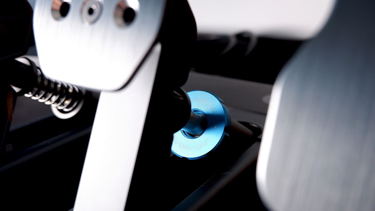 Logitech G Pro Racing Wheel and Pedals installed on a computer desk