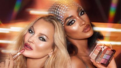 Charlotte Tilbury Black Friday - kate moss and jourdan dunn posing with party makeup holding charlotte tilbury products