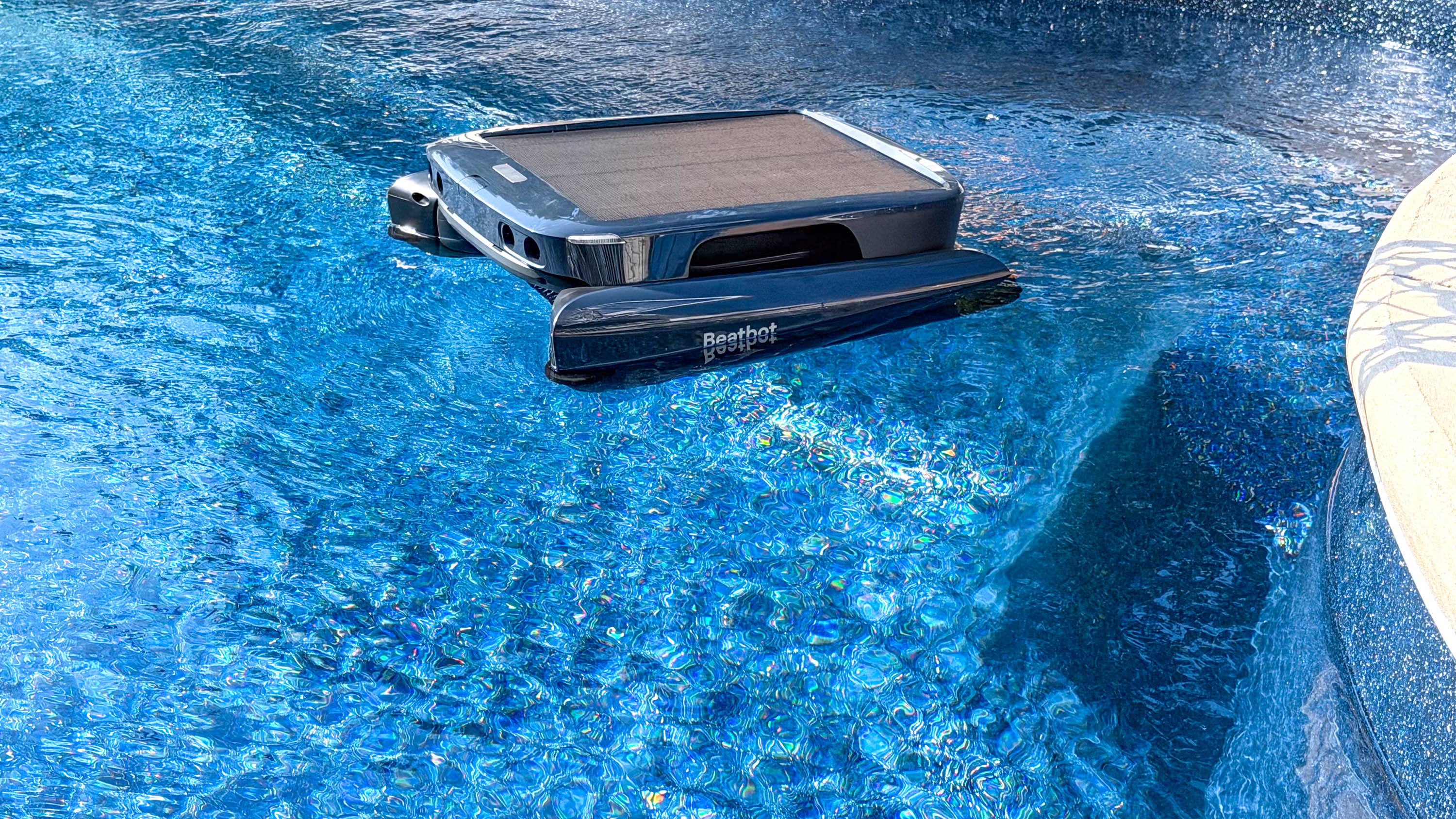 BeatBot iSkim skimmer shown in the pool