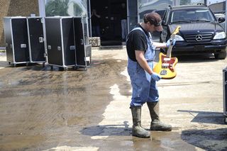Brent Ware pulls a Fender guitar from the city's largest musician equipment storage facility Soundcheck Nashville on May 7, 2010 in Nashville, TN.