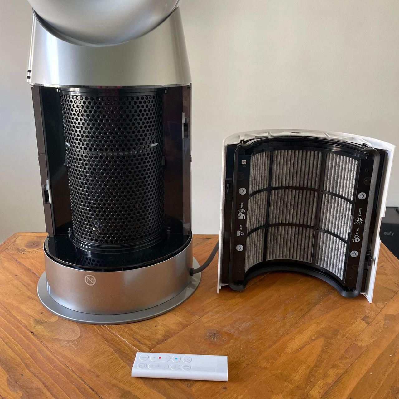 Close up of the Dyson Purifier Hot+Cool HP1 Purifying Fan Heater filter, sitting on a wooden table