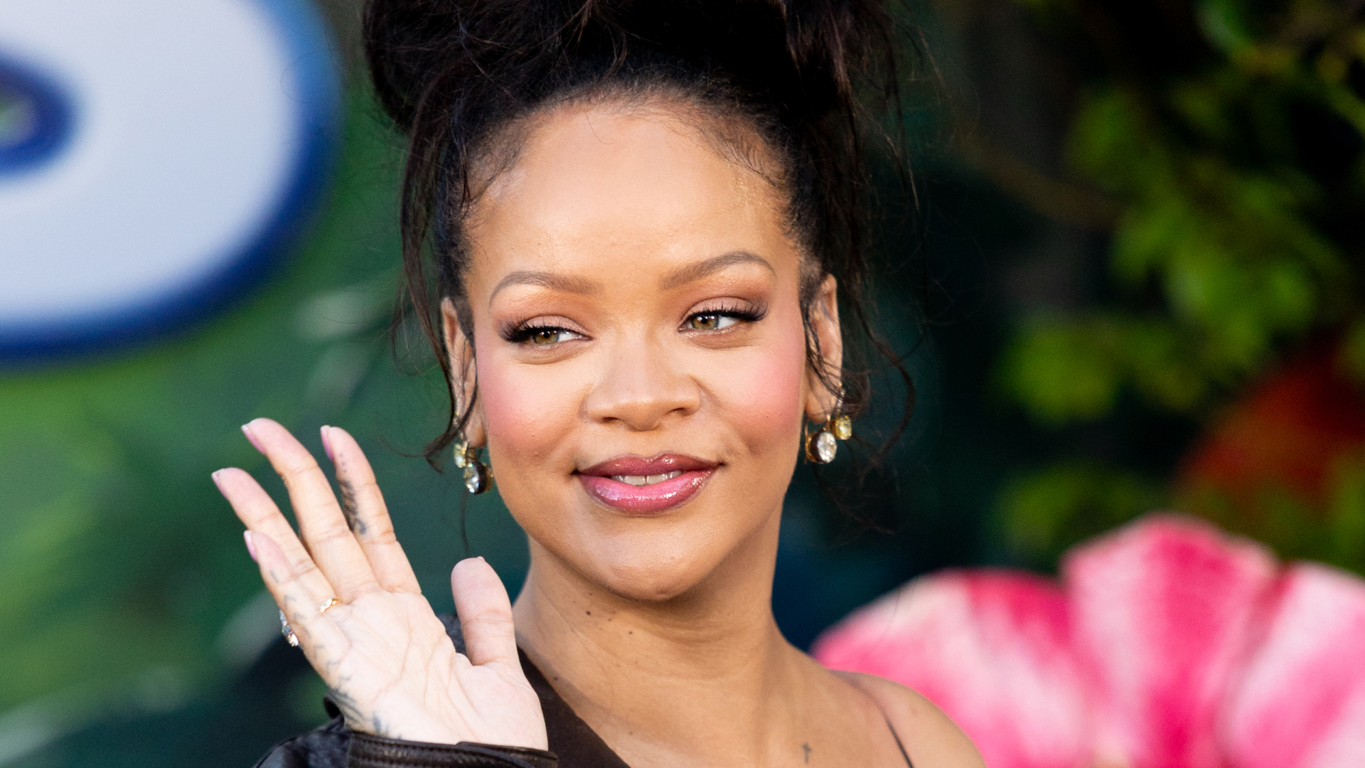 Rihanna waving to the camera
