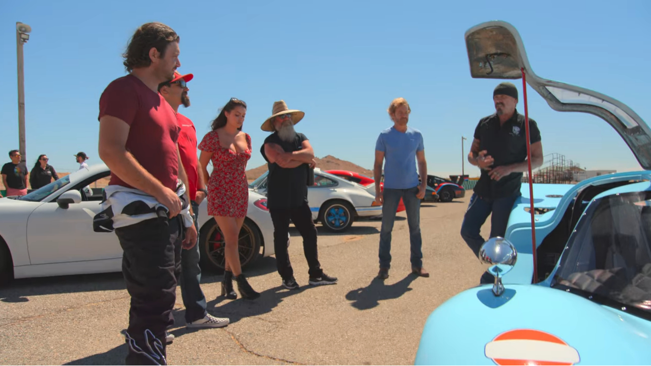 People standing around the car at 5.  Car Masters: Rust to Riches