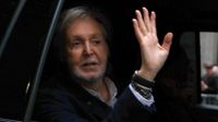 Paul McCartney waves from a car, 2026