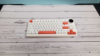 The Gamakay LK75 75%, a white and orange mechanical keyboard