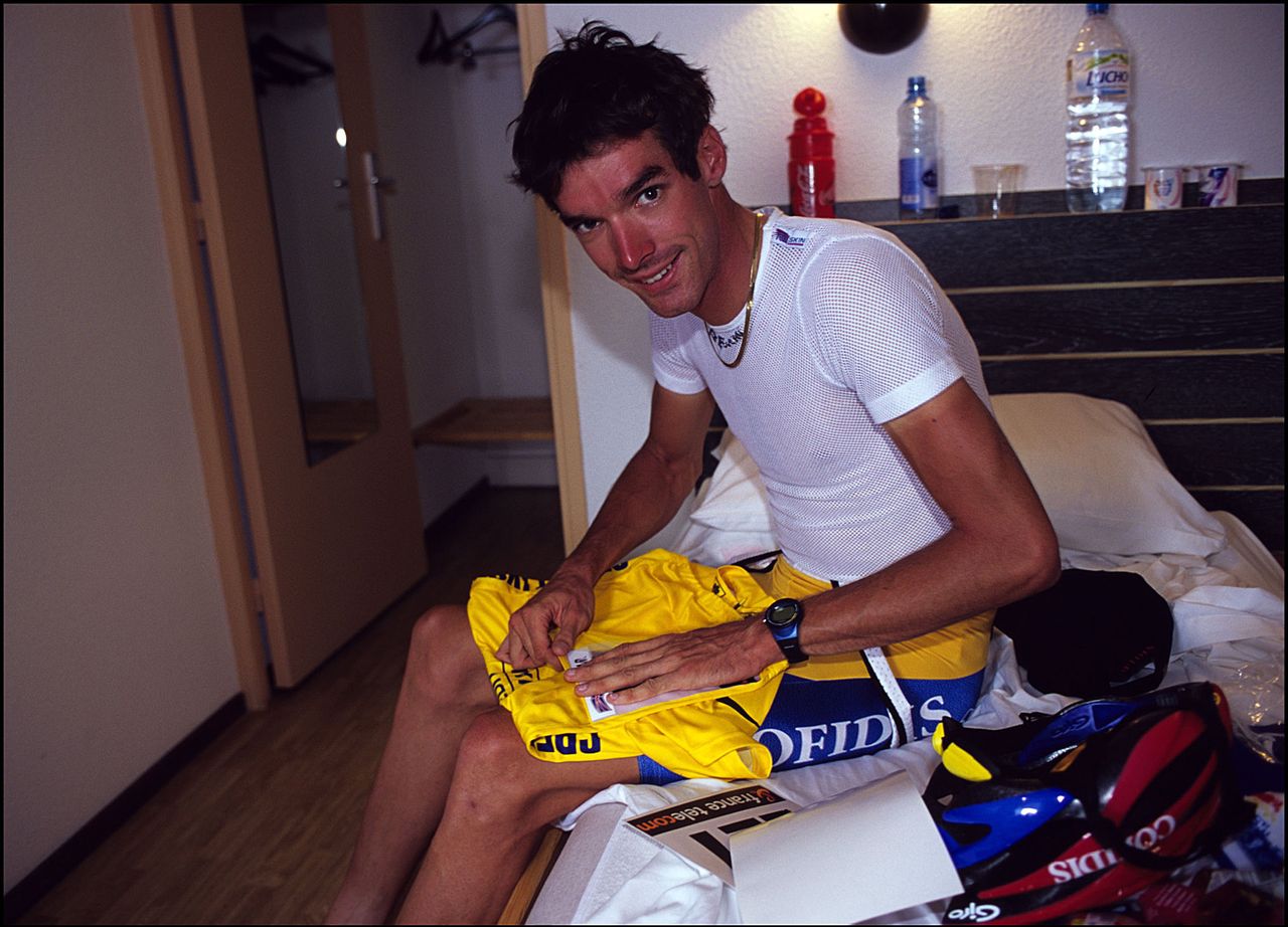 Pinning his number on to the yellow jersey in 2000