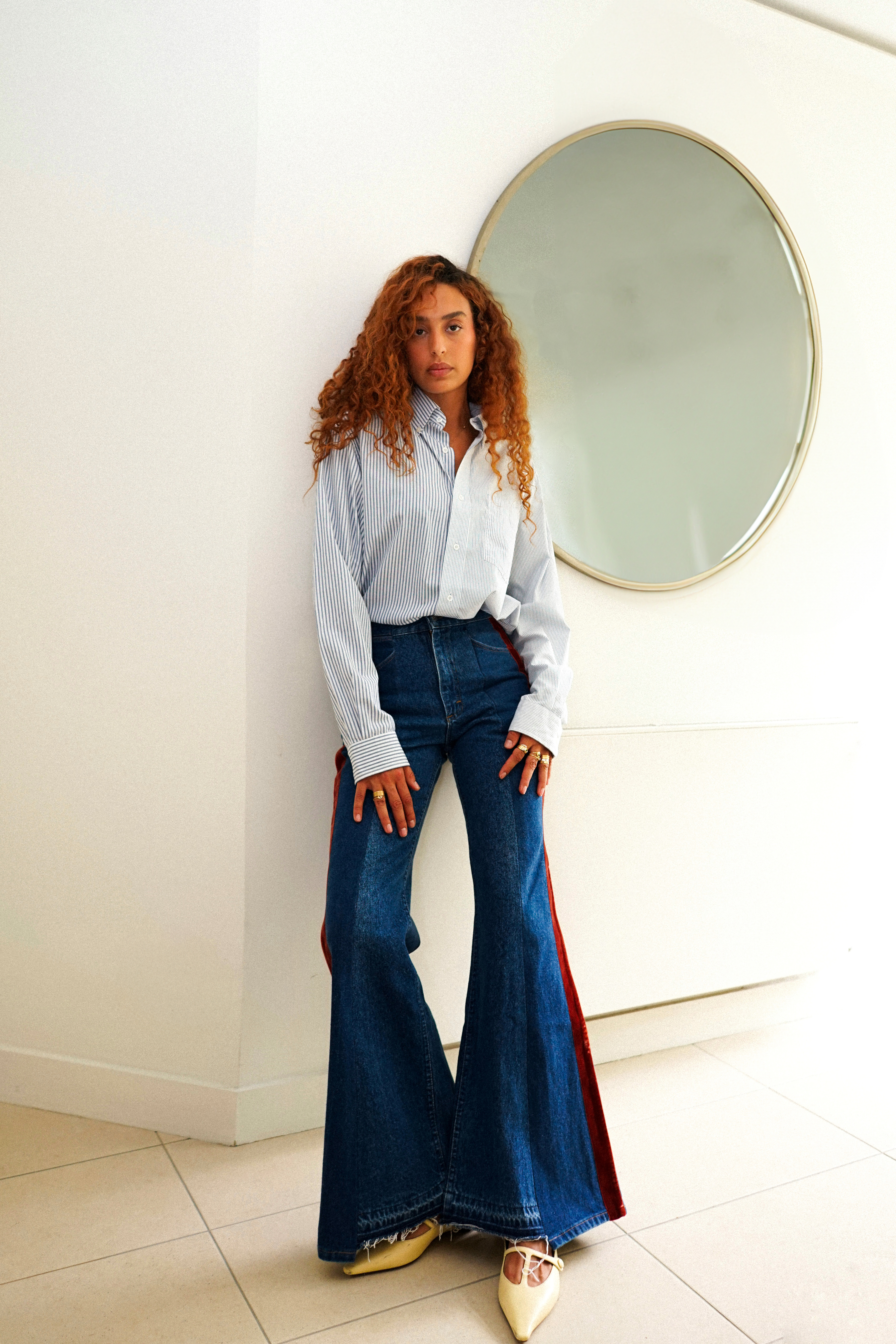 a model posing in jeans for the elv denim campaign