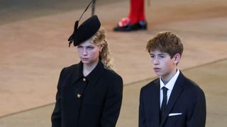 James, Viscount Severn and Lady Louise Windsor walk as procession with the coffin of Queen Elizabeth arrives at Westminster Hall