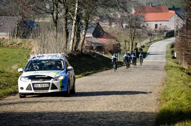 The NetApp-Endura team car leads its riders on a course recon