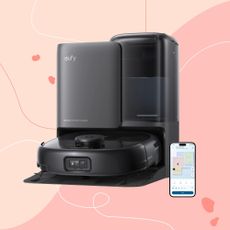 Eufy Robot Vacuum Omni E25 on a pink background
