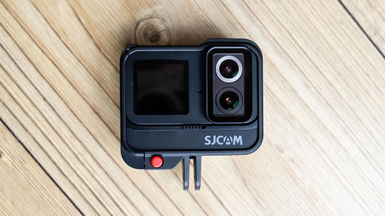 SJCAM SJ20 action camera on a wooden floor