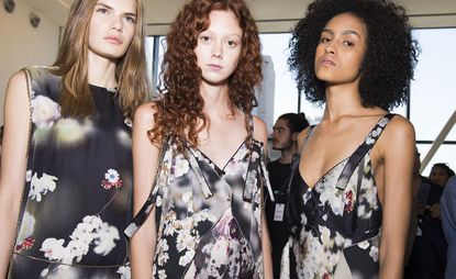 models with flower printed black outfit