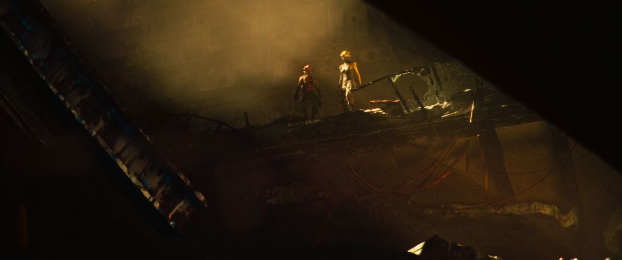 Babiru DaVinci Resolve colour tips; two cyberpunk characters stand in dust looking over a deep hole