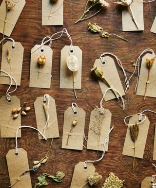 Brown paper tags with string and dried flowers