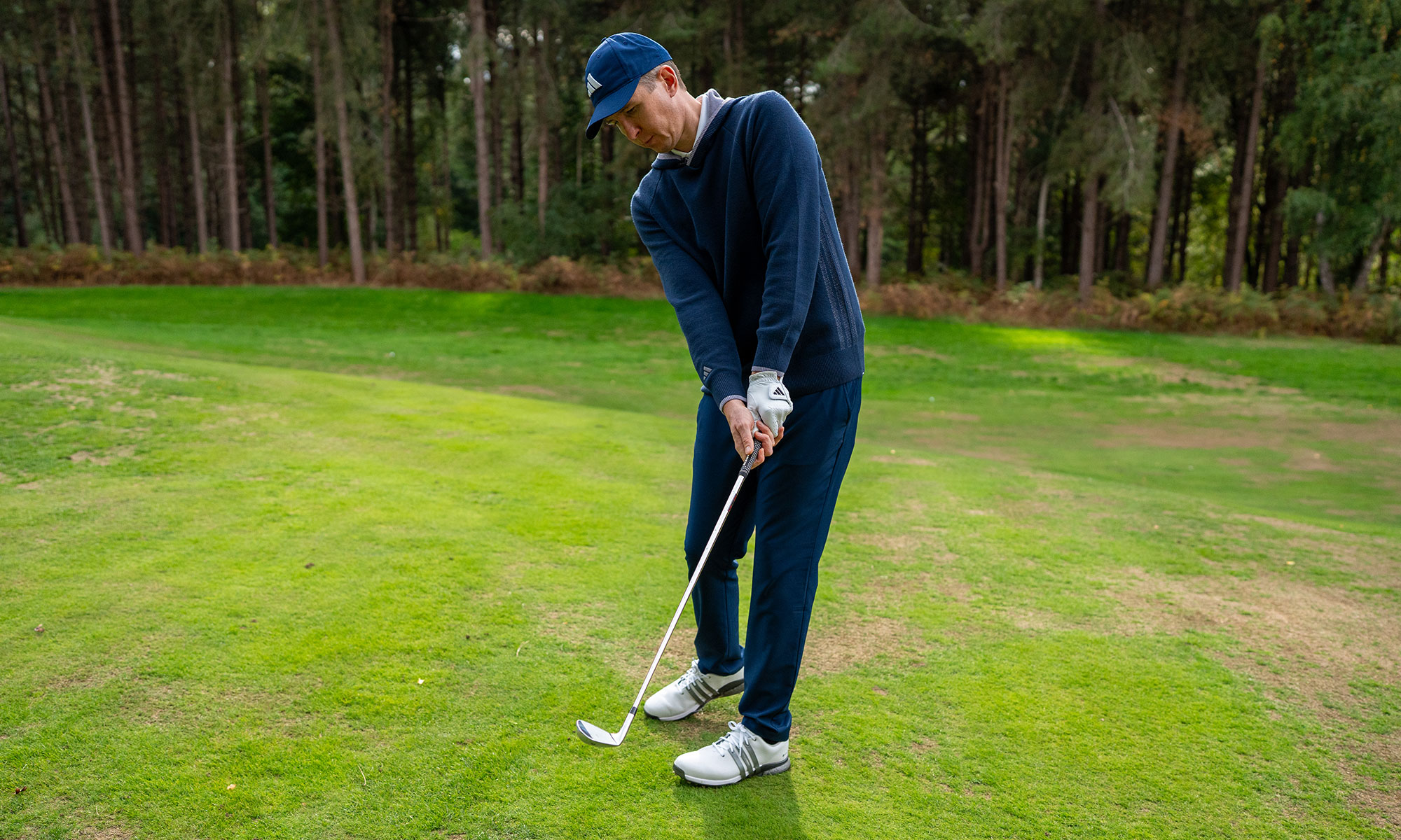 Ben Emerson in the finish position with good rotation when chipping
