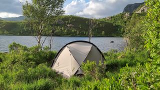 Nortent Vern 1 PC tent pitched next to a lake