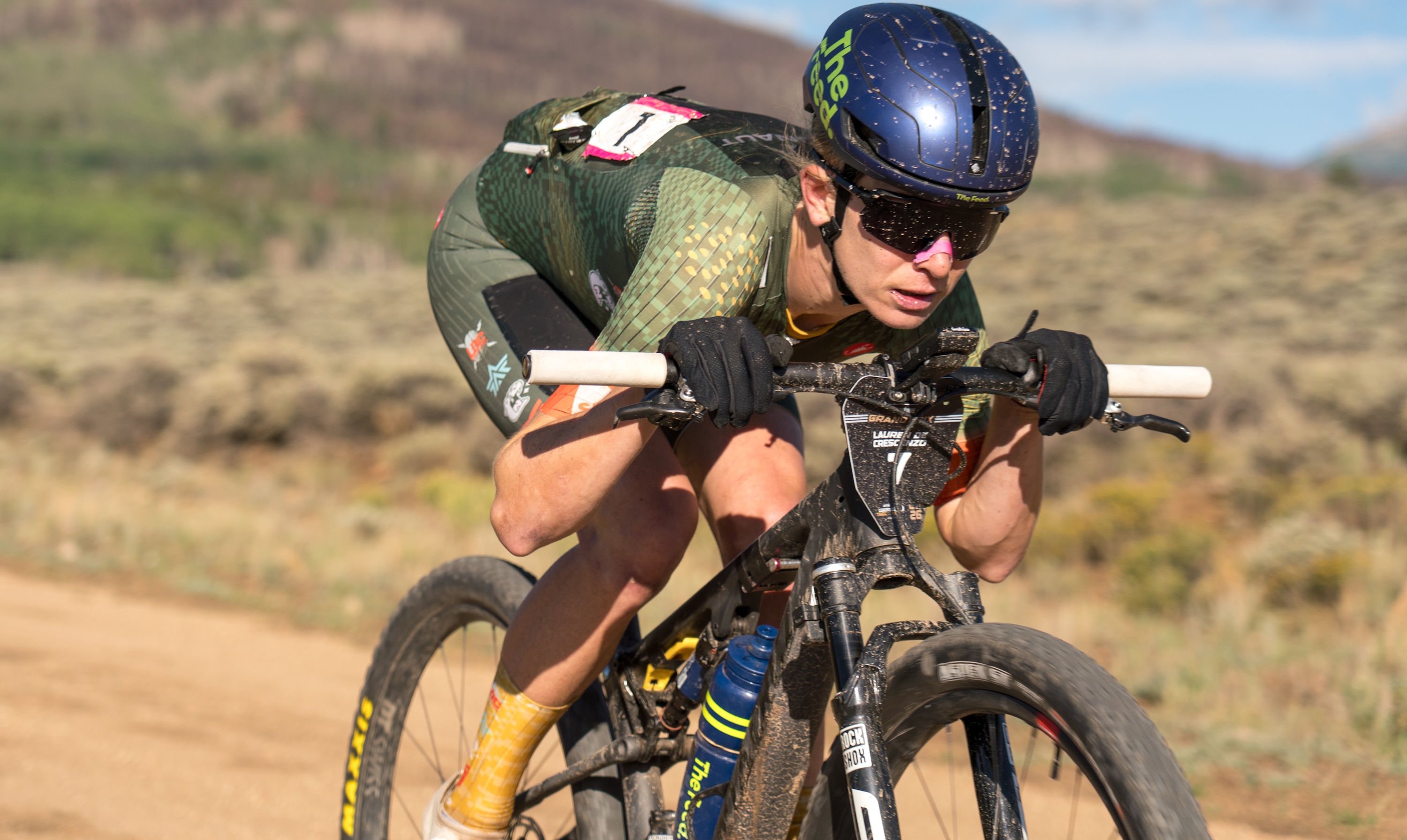 Lauren De Crescenzo uses a tuck position with flat bars at 2026 Leadville Trail 100 MTB