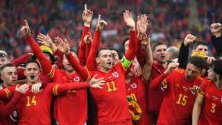 Gareth Bale leads the celebrations after Wales beat Ukraine to qualify for the World Cup