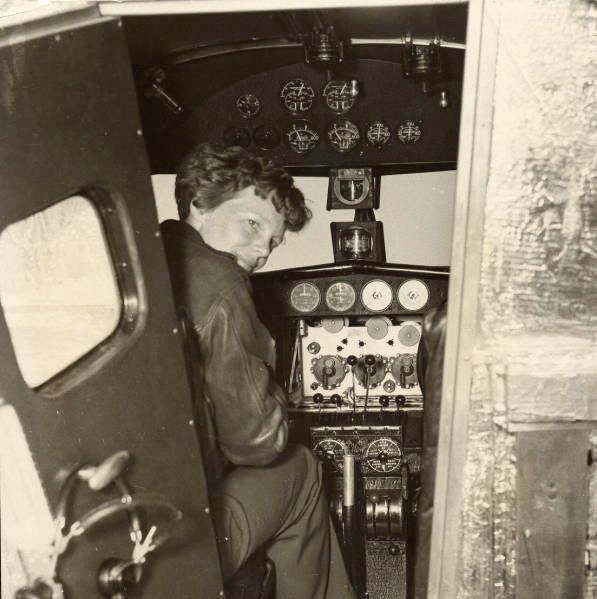 Amelia Earhart in the Electra cockpit, c.1936.