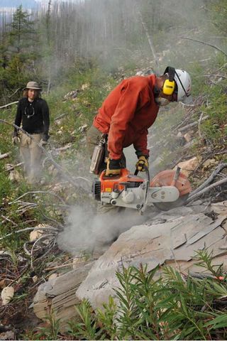 Researchers Michael Streng and Jean-Bernard Caron remove fossils.
