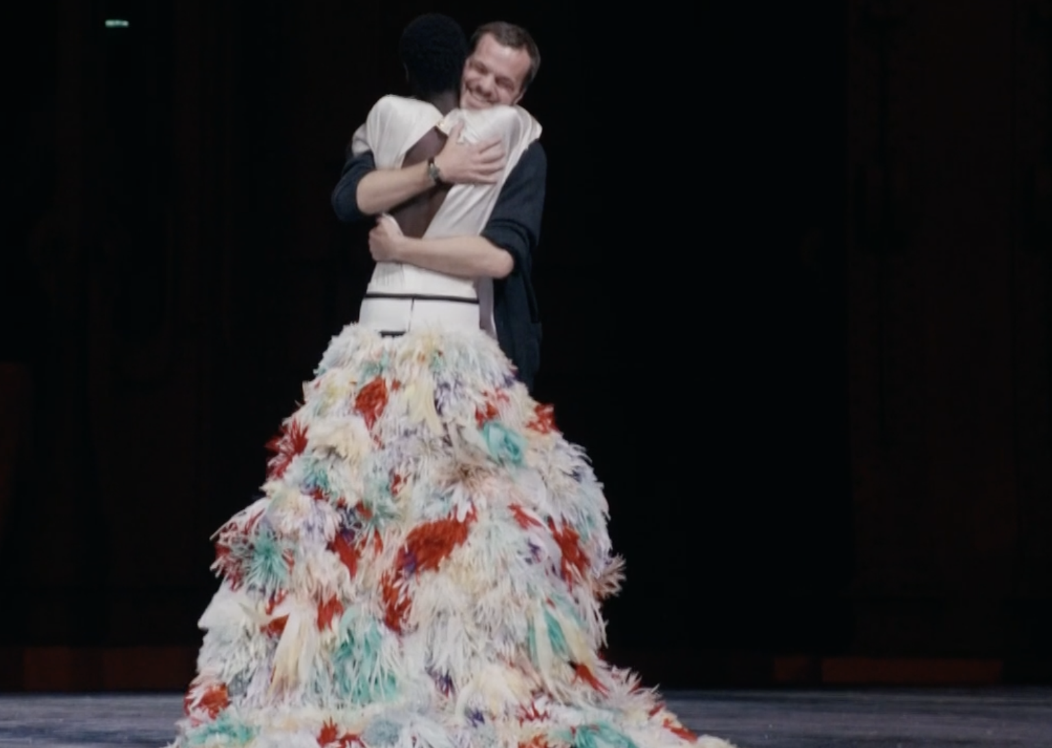 Matthieu Blazy hugging a model on the Chanel runway