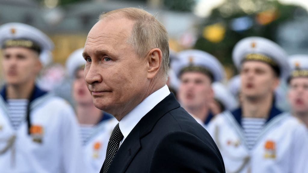 Russian President Vladimir Putin with members of Russia&amp;#039;s navy.