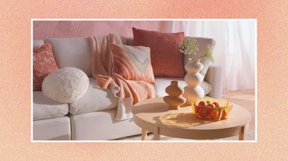 Spring Target decor pieces like throws and candle holders in a peach-colored living room