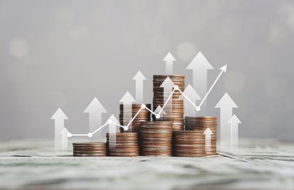 Stack of silver coins with trading chart in financial concepts and financial investment business stock growth