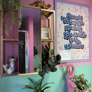 bathroom with mirror potted plant and mirror