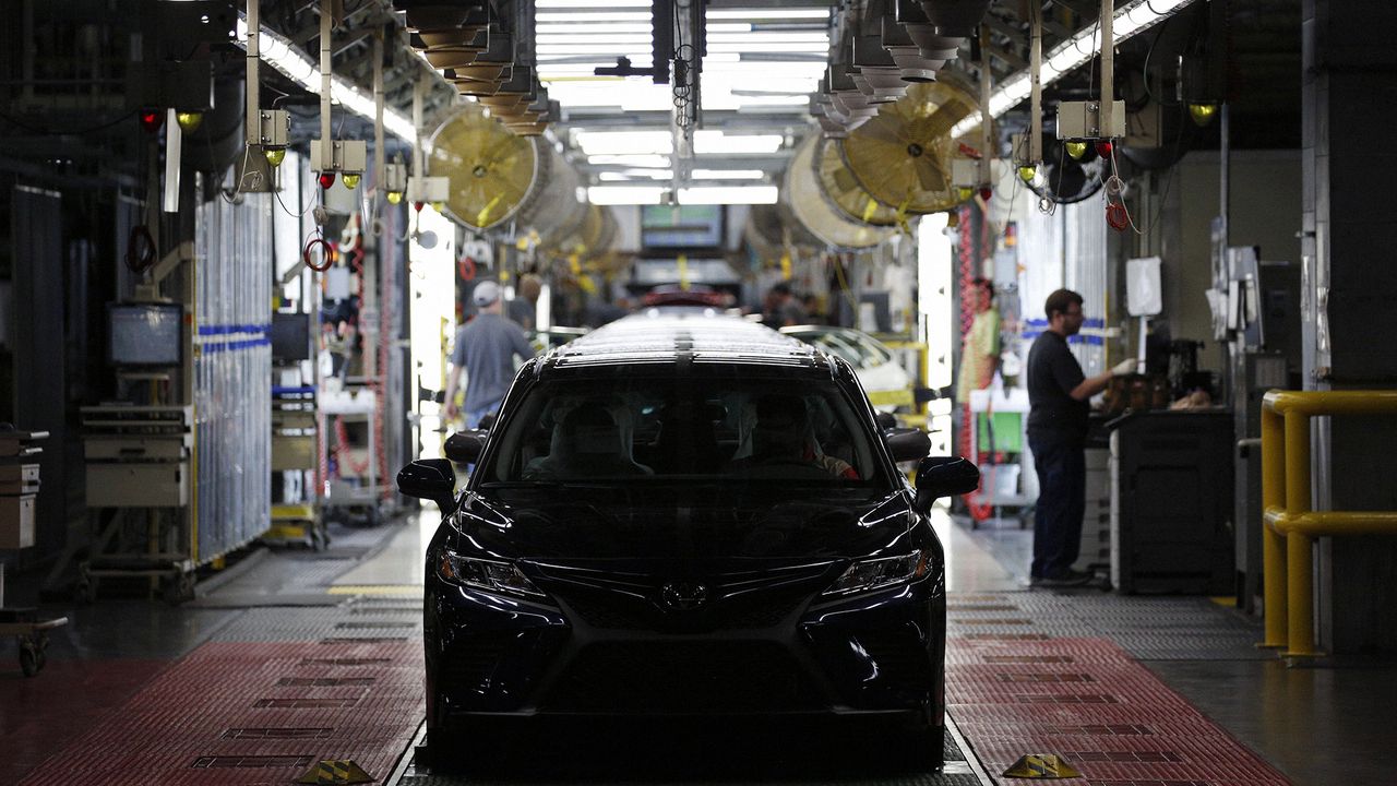 Vehicles coming off the assembly line at a Toyota manufacturing plant