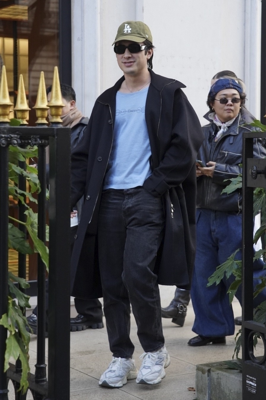 Hudson Williams was spotted at Paris Men's Fashion Week wearing chunky New Balance 9060 sneakers