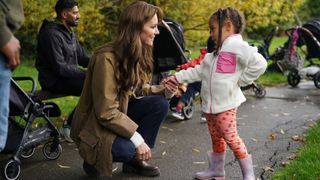 Kate Middleton with a child