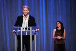 Prince Harry and Meghan Markle attend an Invictus Games event in Vancouver