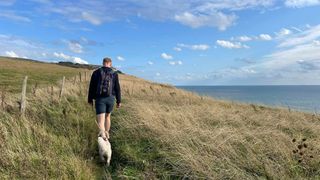 TechRadar fitness writer Harry Bullmore walking with his dog