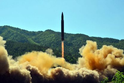 This picture taken on July 4, 2017 and released by North Korea's official Korean Central News Agency (KCNA) on July 5, 2017 shows the successful test-fire of the intercontinental ballistic mi