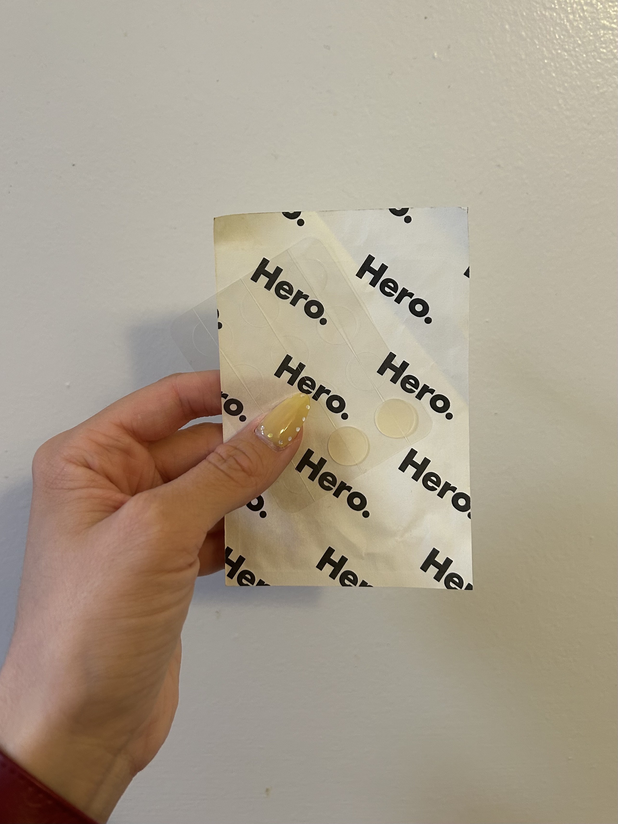 Alyssa Brascia holding her pack of Hero Cosmetics Mighty Patch Original.