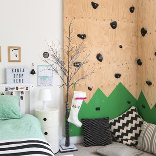children room with mini climbing wall