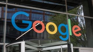Large google logo sign outside a building