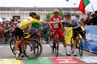 LUZ ARDIDEN FRANCE JULY 15 Tadej Pogaar of Slovenia and UAETeam Emirates Yellow Leader Jersey Mark Cavendish of The United Kingdom and Team Deceuninck QuickStep Green Points Jersey Anthony Perez of France and Team Cofidis Jonas Vingegaard of Denmark and Team JumboVisma White Best Young Rider Jersey at start during the 108th Tour de France 2021 Stage 18 a 1297km stage from Pau to Luz Ardiden 1715m LeTour TDF2021 on July 15 2021 in Luz Ardiden France Photo by Chris GraythenGetty Images