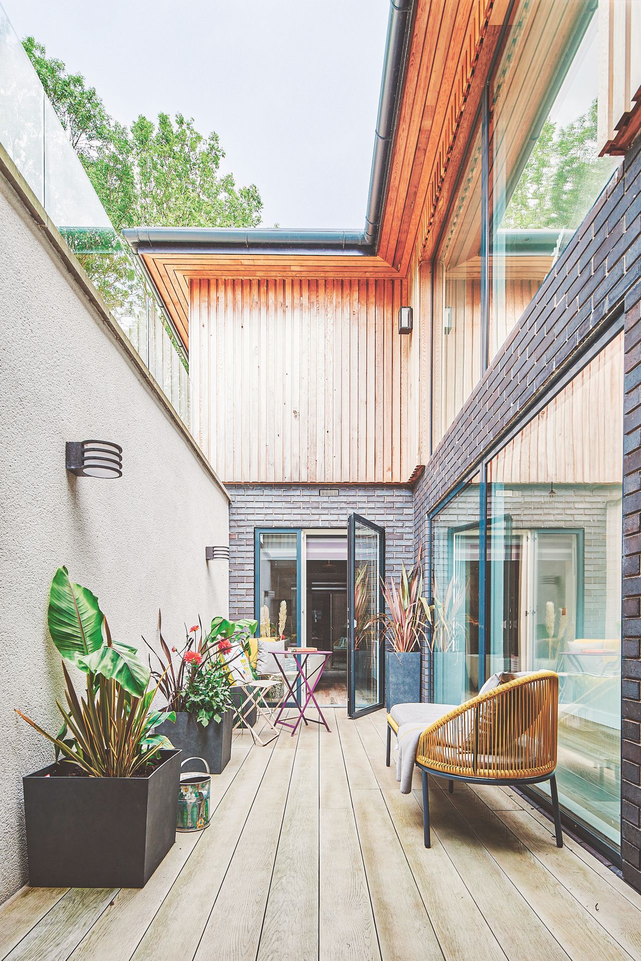 small courtyard in self build with glazing