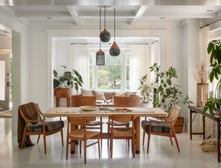 a dining room with mismatched chairs