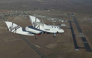 Preparing for landing, the VSS2 Enterprise glides through the sky during the first solo test glide test of SpaceShipTwo on Oct. 10, 2010.