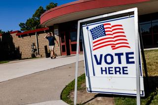 A voter departs after casting their ballot at a polling location at the Jack & Patti Salter Community Center during a primary election in Royal Oak, Michigan, US, on Tuesday, Aug. 4, 2026. The fight between the progressive and centrist wings of the Democratic party reaches its most consequential front of the 2026 midterm primary cycle with Michigan voters set to catapult either Abdul El-Sayed or Haley Stevens to a general election that could decide the balance of power in the US Senate. Photographer: Emily Elconin/Bloomberg