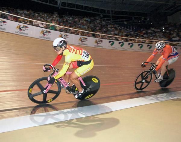 Simona Krupeckaite (Lithuania), left, and Willy Kanis (Netherlands) race for gold in the women's sprint final.