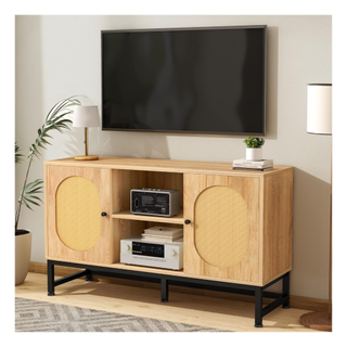 A rattan tv stand with black embellishments
